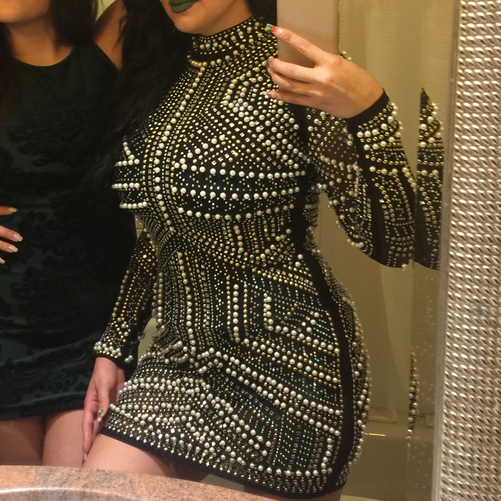 Beaded, weighted, special occasion dress.